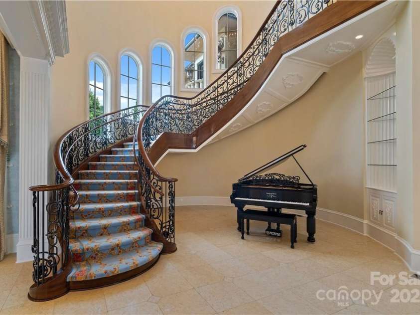 18019 Harbor Light Boulevard, Cornelius, NC 28031.  MLS# CAR3895525, YatesRealty ID 1. Grand Staircase