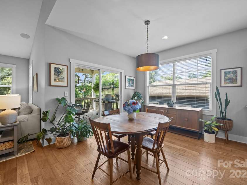 5 Meeting Street, Asheville, NC 28803.  MLS# CAR4298172, YatesRealty ID 10. Dining area with access to back porch