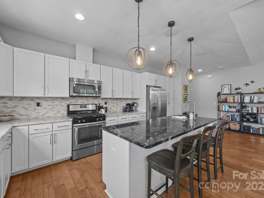 5 Meeting Street, Asheville, NC 28803.  MLS# CAR4298172, YatesRealty ID 10. Great prep area/breakfast bar