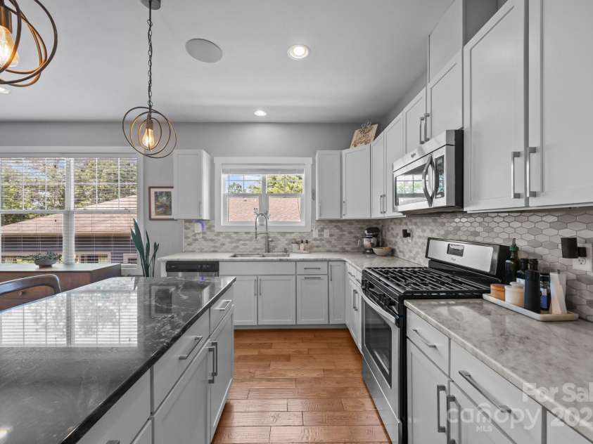 5 Meeting Street, Asheville, NC 28803.  MLS# CAR4298172, YatesRealty ID 10. Lots of workspace