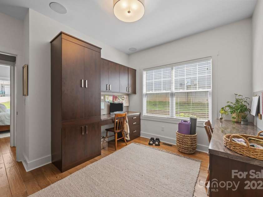 5 Meeting Street, Asheville, NC 28803.  MLS# CAR4298172, YatesRealty ID 10. Third bedroom with built-ins