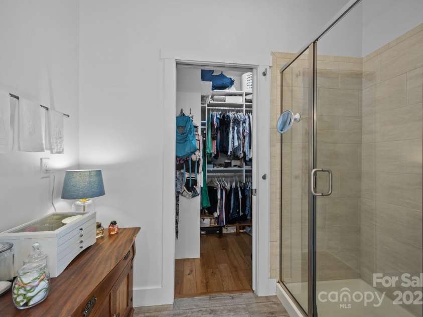 5 Meeting Street, Asheville, NC 28803.  MLS# CAR4298172, YatesRealty ID 10. Tiled shower and walk-in closet
