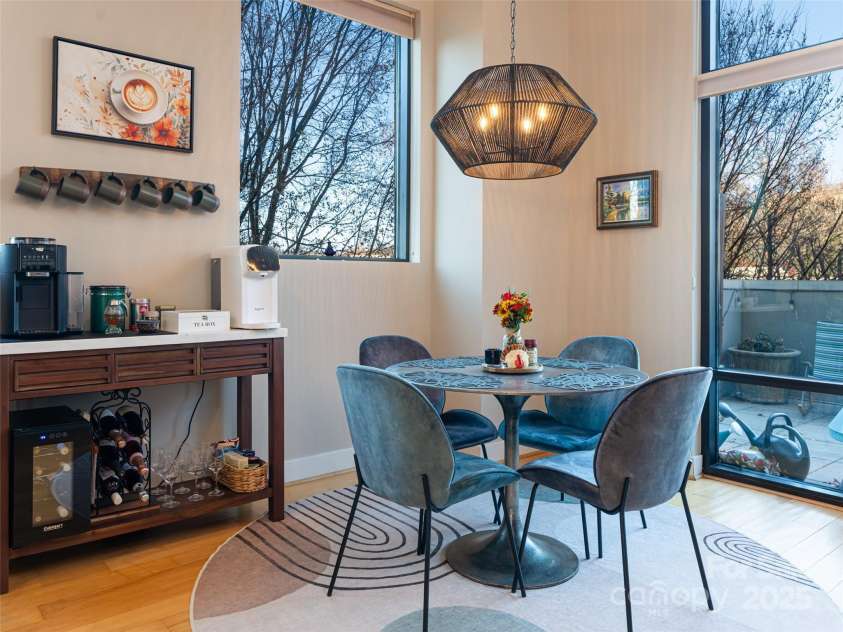 60 Market Street, Asheville, NC 28801.  MLS# CAR4321764, YatesRealty ID 1000. Tree-lined views from living and dining areas