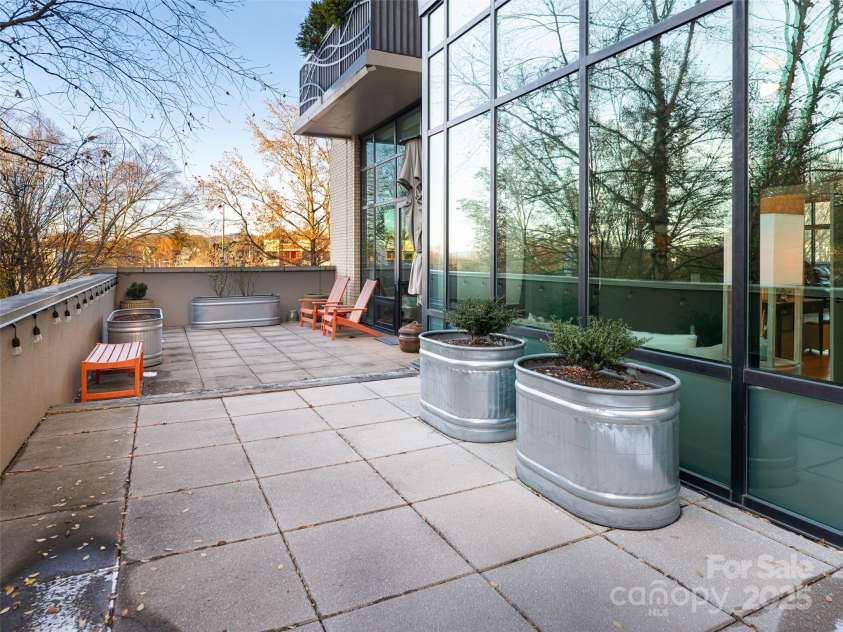 60 Market Street, Asheville, NC 28801.  MLS# CAR4321764, YatesRealty ID 1000. West-facing private terrace