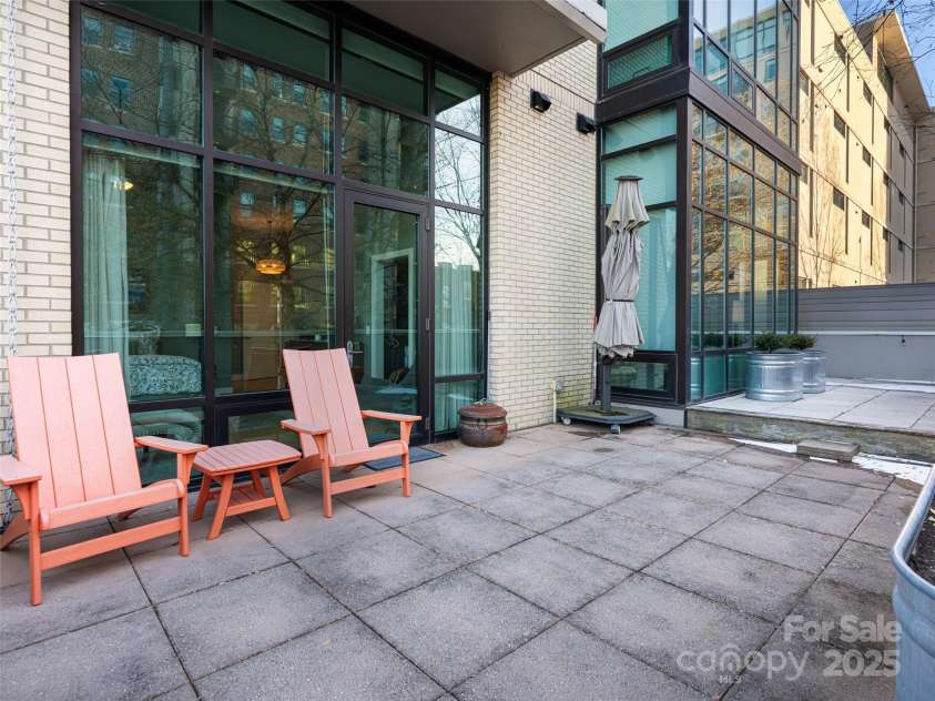 60 Market Street, Asheville, NC 28801.  MLS# CAR4321764, YatesRealty ID 1000. West-facing private terrace