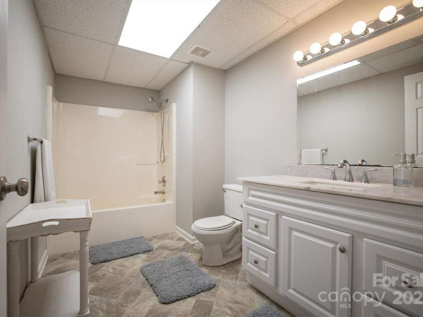 3704 25th Street Place, Hickory, NC 28601.  MLS# CAR4242158, YatesRealty ID 10004. Lower level full bathroom