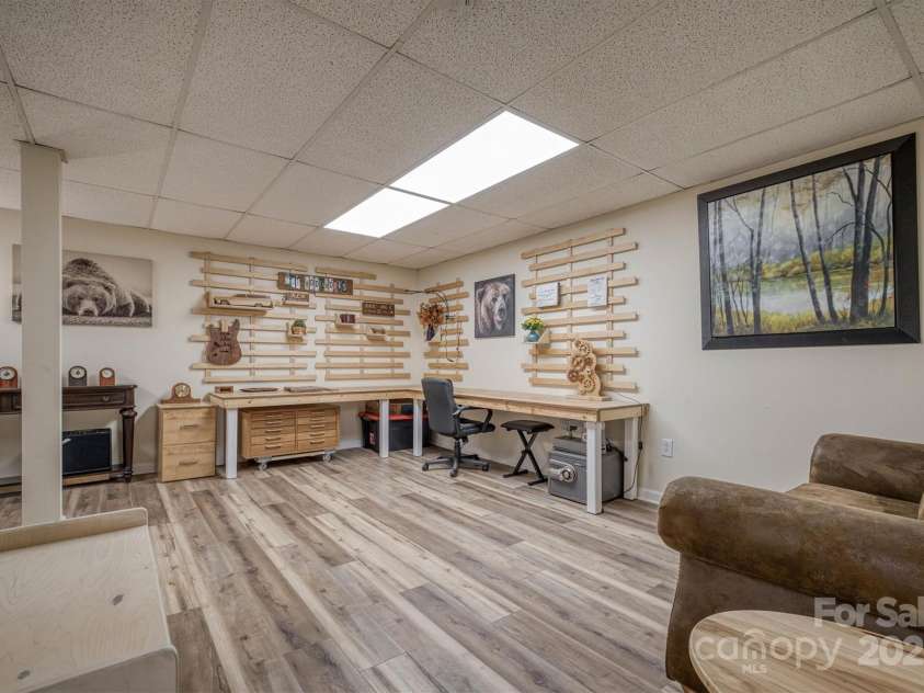 3704 25th Street Place, Hickory, NC 28601.  MLS# CAR4242158, YatesRealty ID 10004. Lower level living room/office