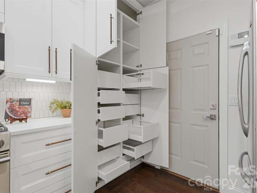 11282 Ballanvilla Drive, Charlotte, NC 28277.  MLS# CAR4362908, YatesRealty ID 10007. Pantry with Full Extending Deep Pull Outs