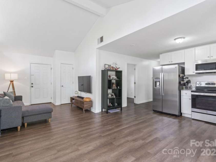 2403 Earley Circle, Kannapolis, NC 28083.  MLS# CAR4239439, YatesRealty ID 10008. Living room / kitchen view