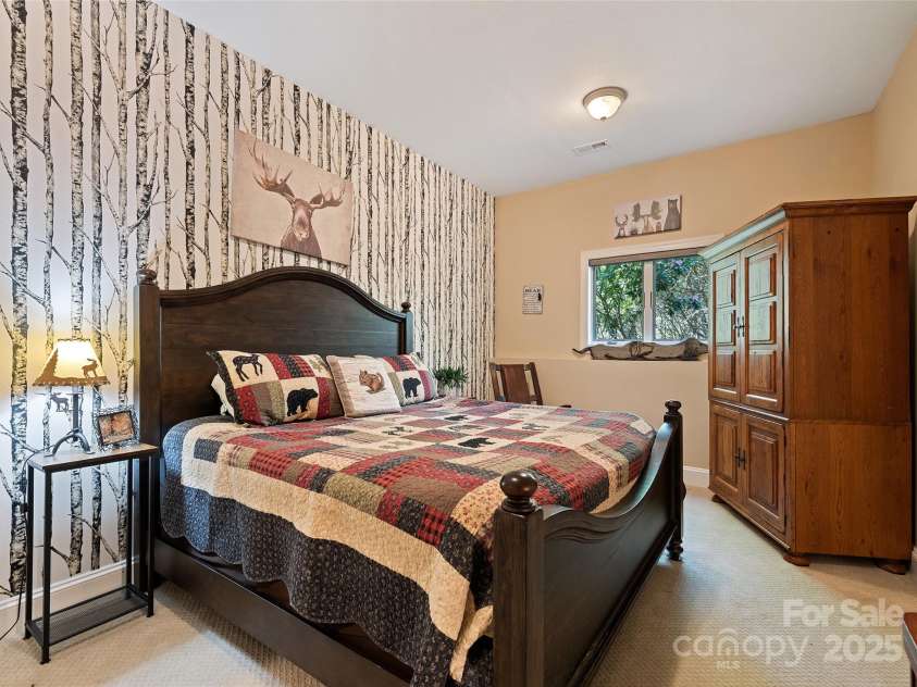 79 Cranberry Lane, Waynesville, NC 28785.  MLS# CAR4245690, YatesRealty ID 10010. Bedroom with french doors