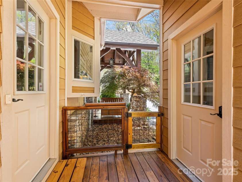79 Cranberry Lane, Waynesville, NC 28785.  MLS# CAR4245690, YatesRealty ID 10010. Breezeway from garage to kitchen