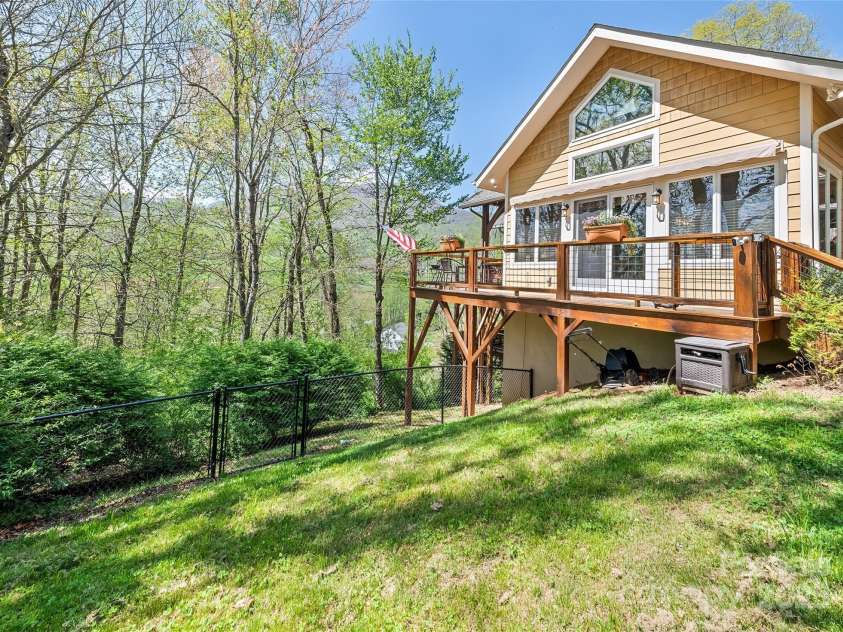 79 Cranberry Lane, Waynesville, NC 28785.  MLS# CAR4245690, YatesRealty ID 10010. Side yard