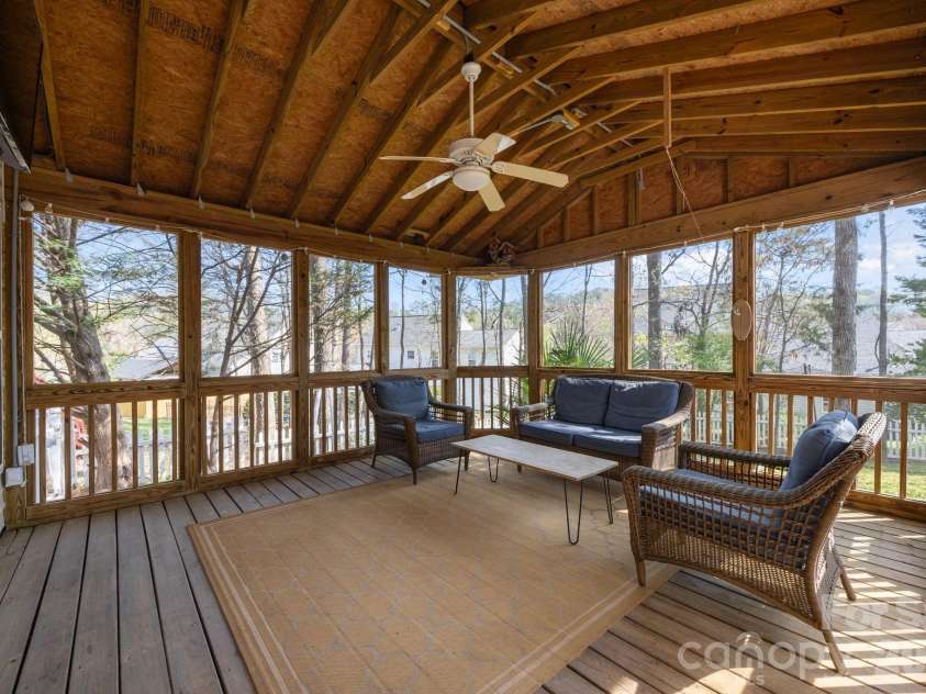 7811 Antique Circle, Waxhaw, NC 28173.  MLS# CAR4358632, YatesRealty ID 10011. Back screened porch