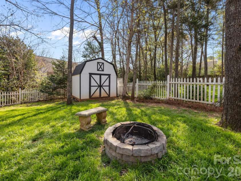 7811 Antique Circle, Waxhaw, NC 28173.  MLS# CAR4358632, YatesRealty ID 10011. Backyard Shed
