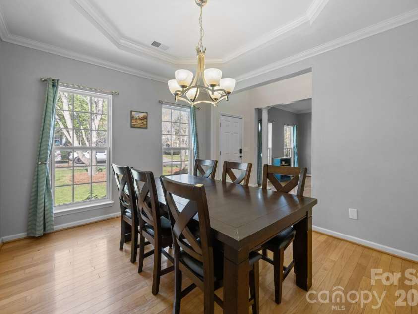 7811 Antique Circle, Waxhaw, NC 28173.  MLS# CAR4358632, YatesRealty ID 10011. Dining with tray ceiling