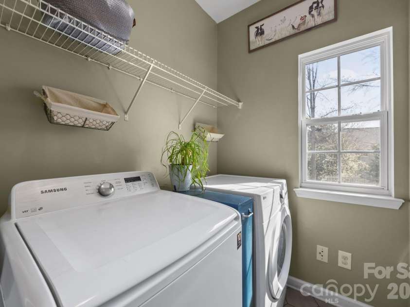 7811 Antique Circle, Waxhaw, NC 28173.  MLS# CAR4358632, YatesRealty ID 10011. Laundry room on main