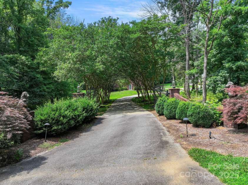 6620 Old Concord Road, Salisbury, NC 28146.  MLS# CAR4154321, YatesRealty ID 10014. Grand gated entry to the primary residence.