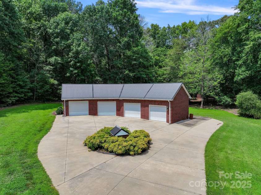 6620 Old Concord Road, Salisbury, NC 28146.  MLS# CAR4154321, YatesRealty ID 10014. Heated and cooled huge 4 bay garage