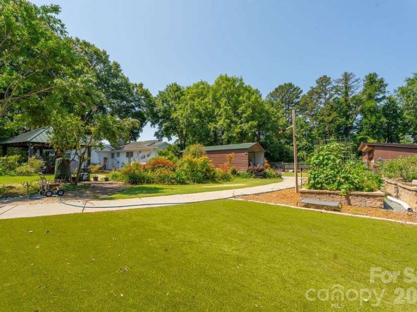 9032 Boyd Drive, Matthews, NC 28105.  MLS# CAR4281009, YatesRealty ID 10016. 
