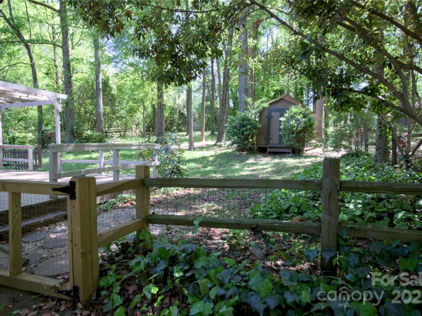 10708 Danesway Lane, Cornelius, NC 28031.  MLS# CAR4247970, YatesRealty ID 10017. Enjoy The Privacy Of This Backyard Oasis