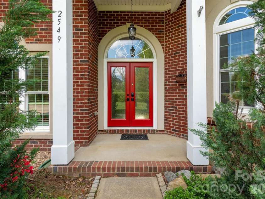 2549 Harlington Lane, Charlotte, NC 28270.  MLS# CAR4366037, YatesRealty ID 10018. Inviting new front door.