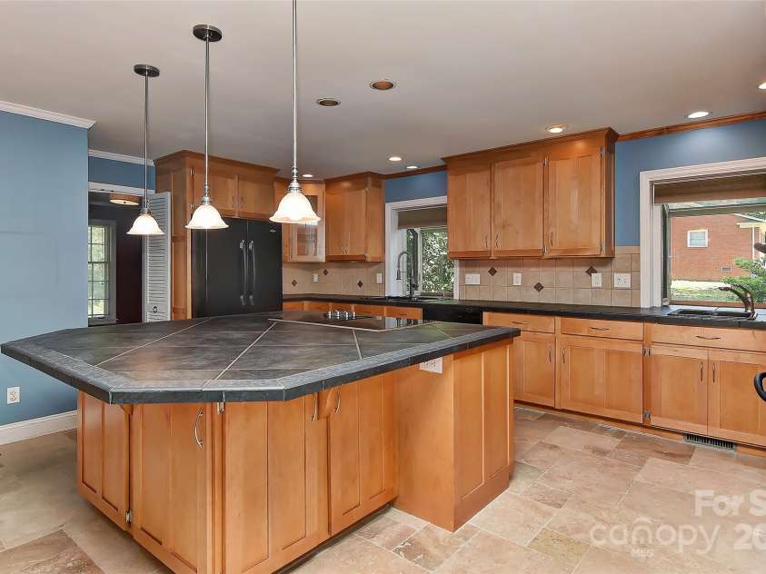 385 Gum Branch Road, Charlotte, NC 28214.  MLS# CAR4253596, YatesRealty ID 10019. 