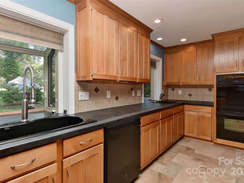 385 Gum Branch Road, Charlotte, NC 28214.  MLS# CAR4253596, YatesRealty ID 10019. 