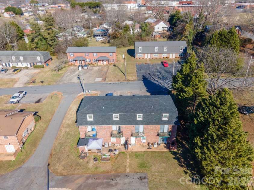 18 Berkley Avenue, Granite Falls, NC 28630.  MLS# CAR4336892, YatesRealty ID 1002. Back of Upper Building - Two Basement Apartments with 2 Bedrooms and 1 Full Bath