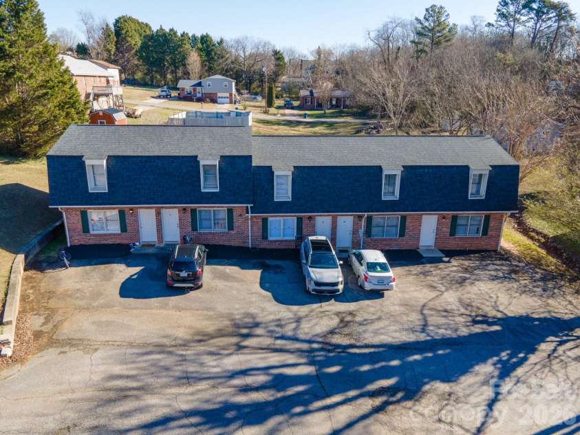 18 Berkley Avenue, Granite Falls, NC 28630.  MLS# CAR4336892, YatesRealty ID 1002. Lower Building - 5 Apartments with 2 Bedrooms and 1 1/2 Baths