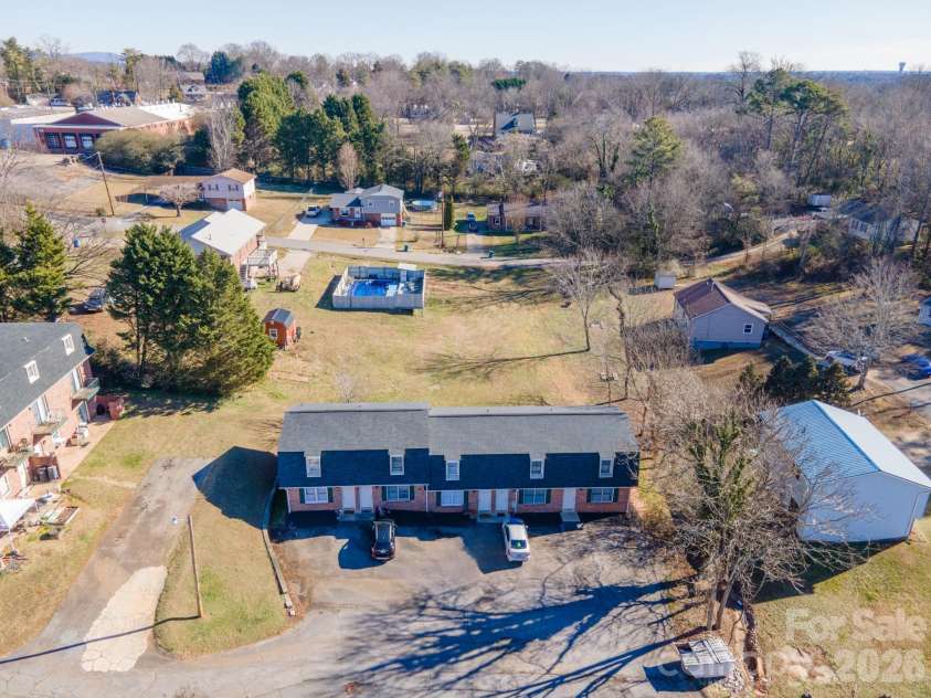 18 Berkley Avenue, Granite Falls, NC 28630.  MLS# CAR4336892, YatesRealty ID 1002. Lower Building - 5 Apartments with 2 Bedrooms and 1 1/2 Baths