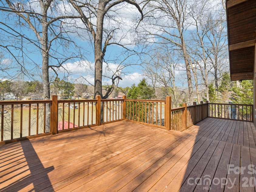 6880 Shade Tree Lane, Sherrills Ford, NC 28673.  MLS# CAR4352839, YatesRealty ID 10025. Enjoy the lake view from the huge deck