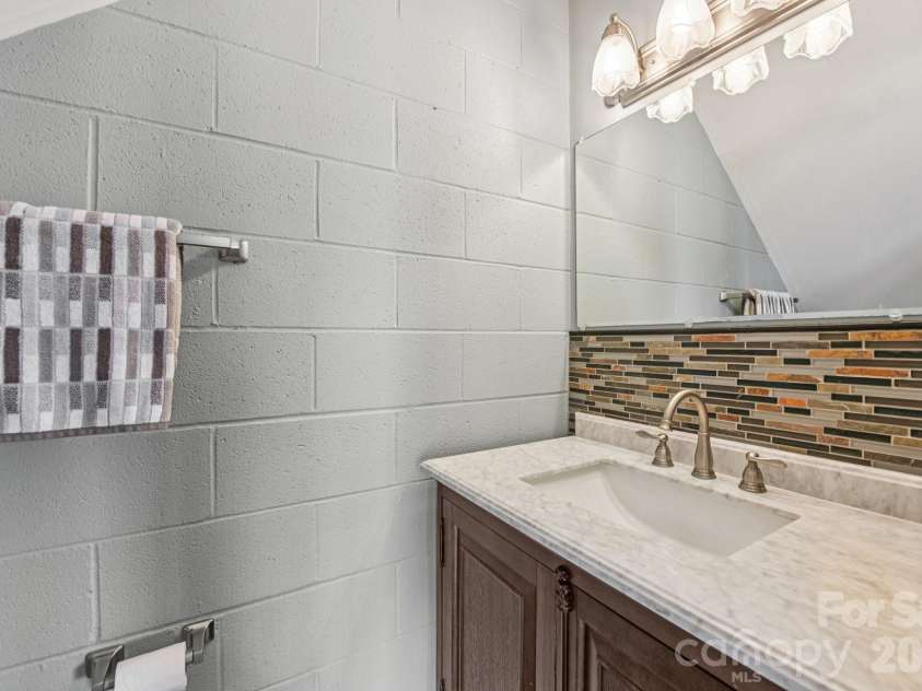 6880 Shade Tree Lane, Sherrills Ford, NC 28673.  MLS# CAR4352839, YatesRealty ID 10025. Half bath in basement