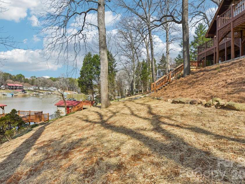 6880 Shade Tree Lane, Sherrills Ford, NC 28673.  MLS# CAR4352839, YatesRealty ID 10025. Landscaped yard