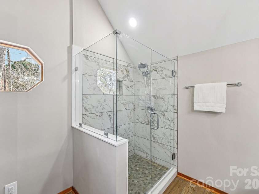 6880 Shade Tree Lane, Sherrills Ford, NC 28673.  MLS# CAR4352839, YatesRealty ID 10025. Tile shower and luxury vinyl plank flooring