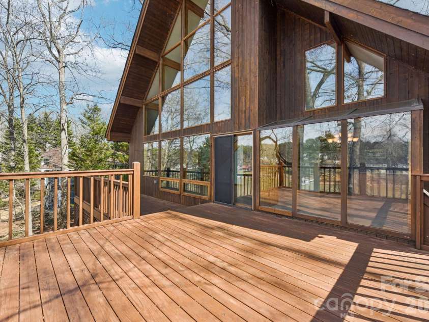 6880 Shade Tree Lane, Sherrills Ford, NC 28673.  MLS# CAR4352839, YatesRealty ID 10025. Wall of windows 