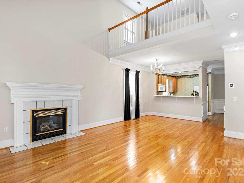 8 Sweet Gum Drive, Asheville, NC 28805.  MLS# CAR4194709, YatesRealty ID 10028. Living Room/Dining Room Empty