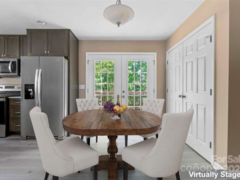 1806 Red Bird Circle, Concord, NC 28025.  MLS# CAR4252674, YatesRealty ID 10030. Staged Dining Area