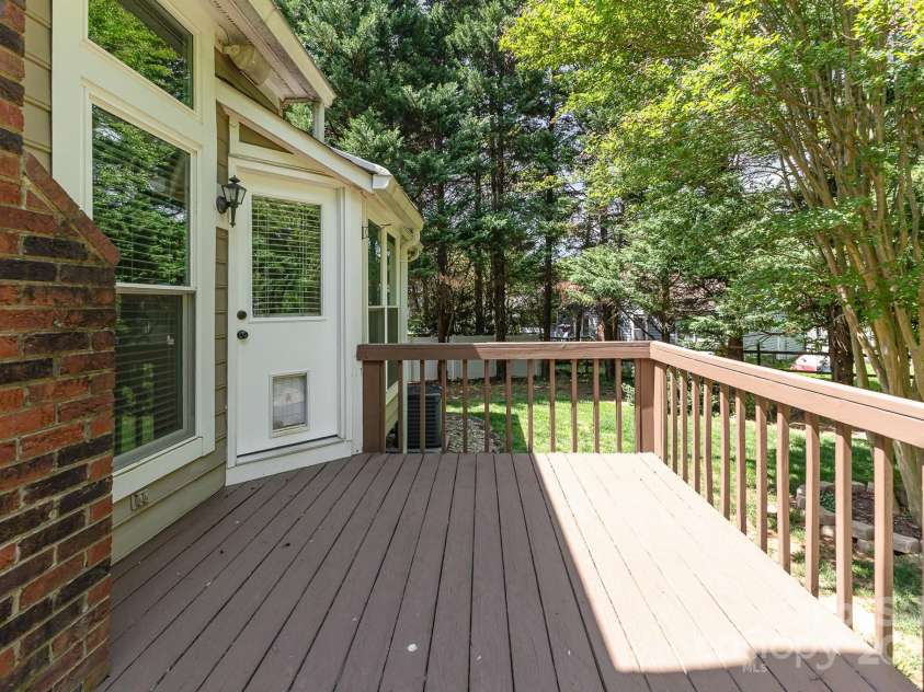 3200 Tallia Court, Charlotte, NC 28269.  MLS# CAR4249625, YatesRealty ID 10032. Fantastic deck shielded from afternoon sun!