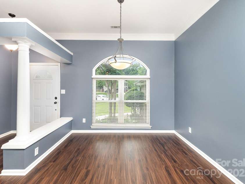 3200 Tallia Court, Charlotte, NC 28269.  MLS# CAR4249625, YatesRealty ID 10032. Formal Dining Area overlooks front yard!