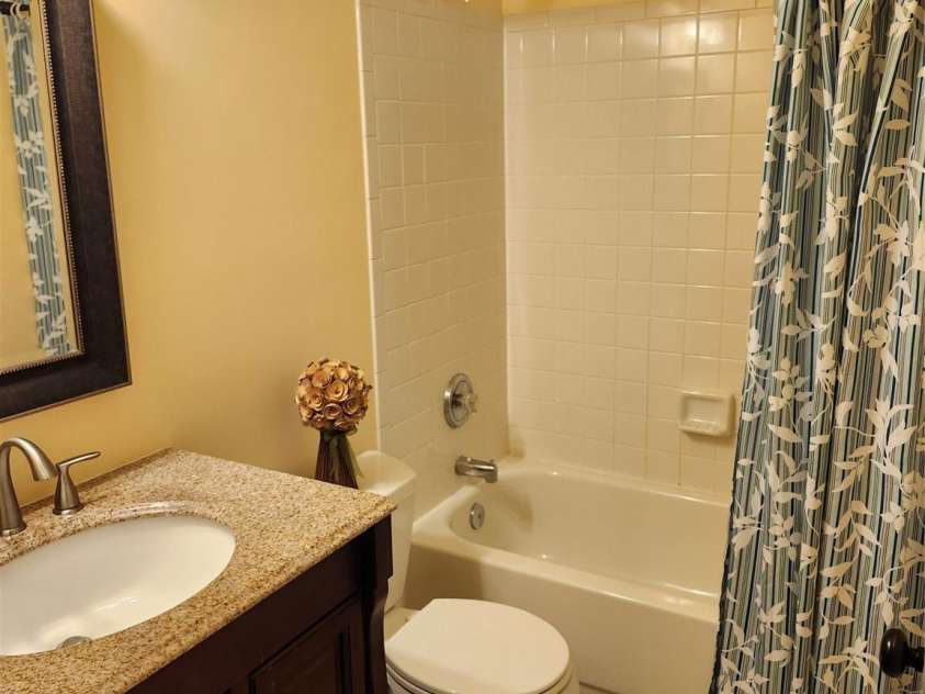 3200 Tallia Court, Charlotte, NC 28269.  MLS# CAR4249625, YatesRealty ID 10032. Staged guest bathroom with gorgeous  granite!