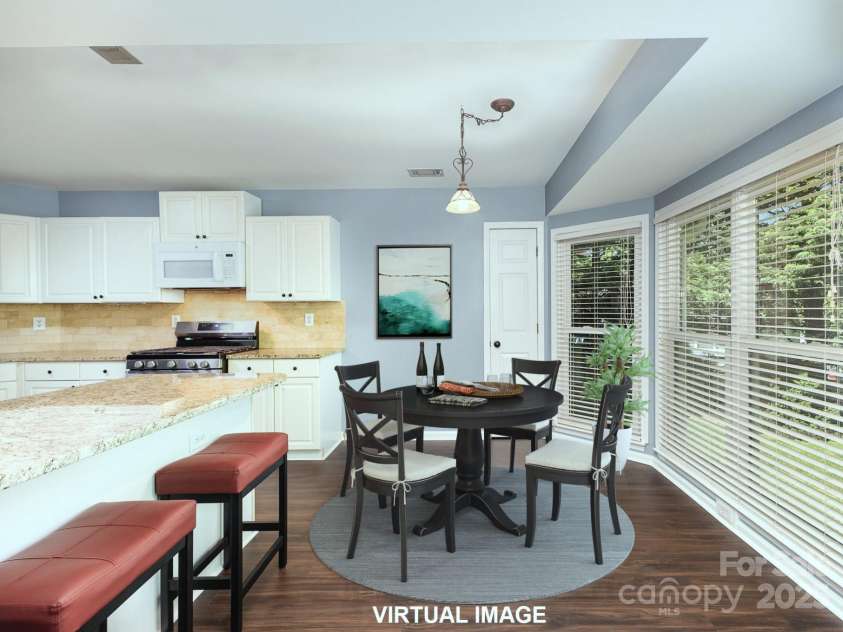 3200 Tallia Court, Charlotte, NC 28269.  MLS# CAR4249625, YatesRealty ID 10032. Virtually staged breakfast area.