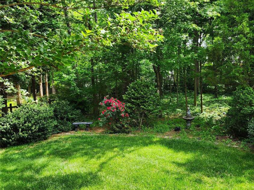 3200 Tallia Court, Charlotte, NC 28269.  MLS# CAR4249625, YatesRealty ID 10032. Welcome to your own piece of paradise!