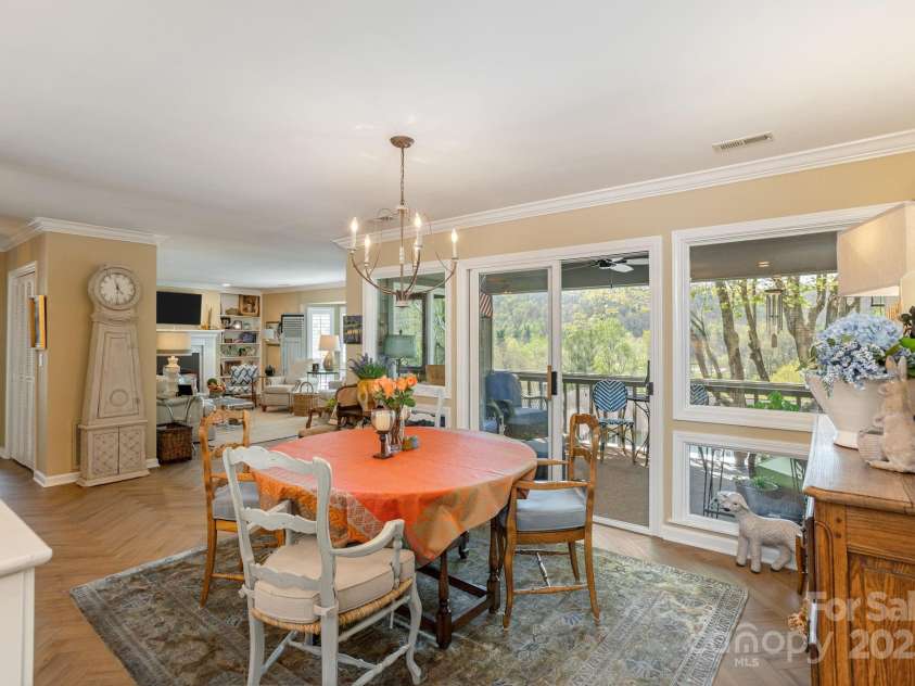 123 Burning Tree Lane, Flat Rock, NC 28731.  MLS# CAR4254140, YatesRealty ID 10040. Dining to Porch