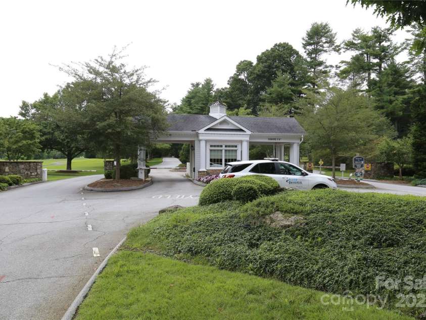 123 Burning Tree Lane, Flat Rock, NC 28731.  MLS# CAR4254140, YatesRealty ID 10040. Gate House
