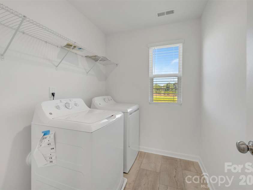 1358 Fremont Drive, Wingate, NC 28174.  MLS# CAR4368121, YatesRealty ID 10050. Laundry room
