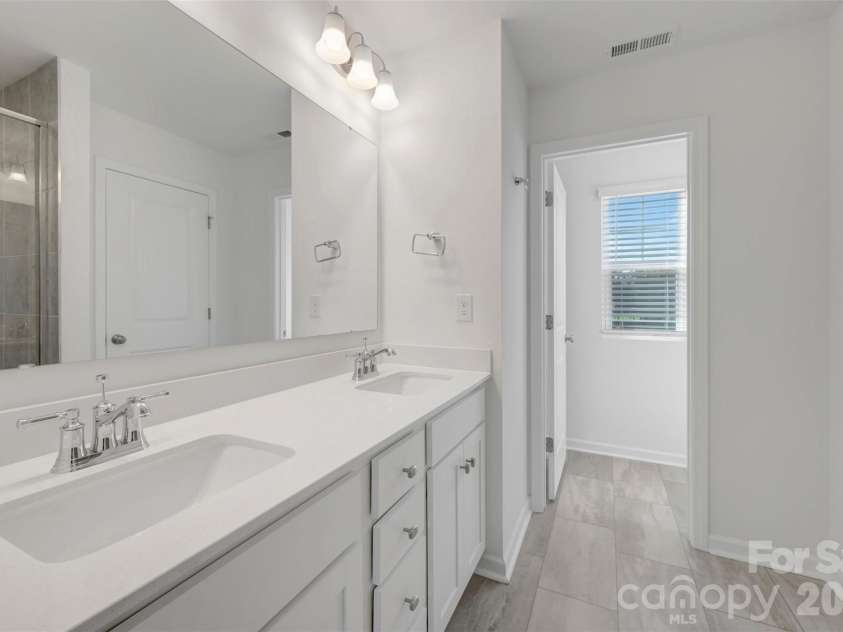 1358 Fremont Drive, Wingate, NC 28174.  MLS# CAR4368121, YatesRealty ID 10050. Owner's suite