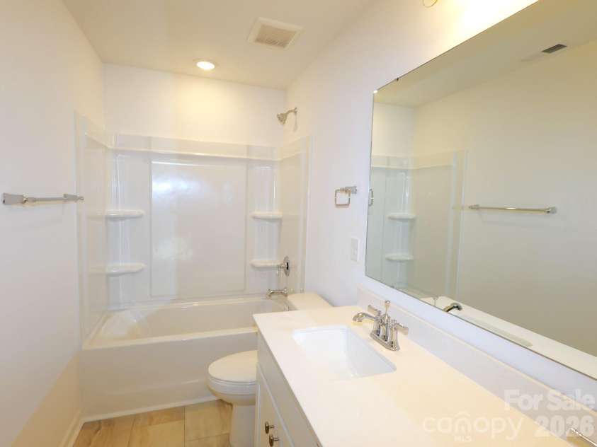 1358 Fremont Drive, Wingate, NC 28174.  MLS# CAR4368121, YatesRealty ID 10050. Secondary bathroom