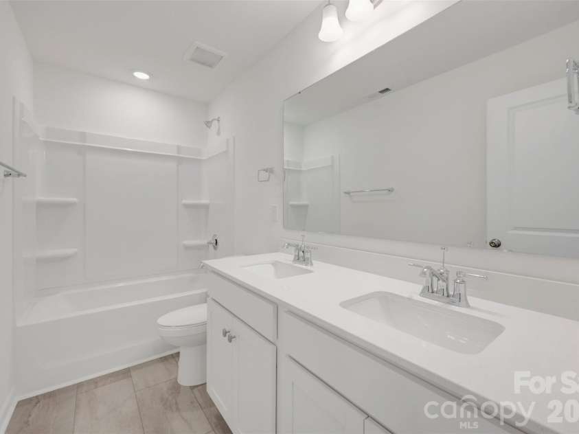1358 Fremont Drive, Wingate, NC 28174.  MLS# CAR4368121, YatesRealty ID 10050. Secondary bathroom