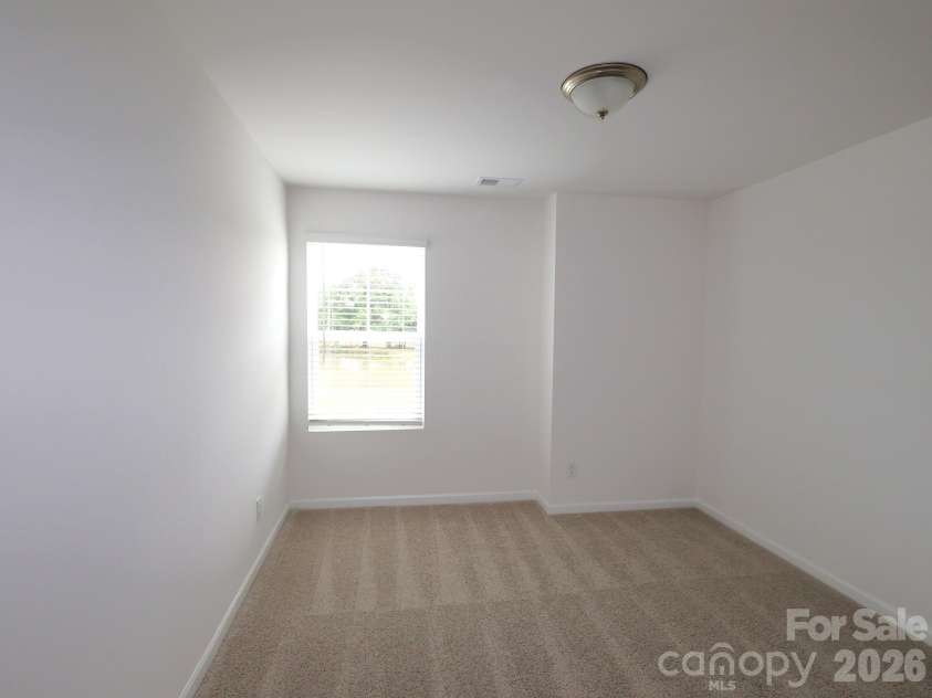 1358 Fremont Drive, Wingate, NC 28174.  MLS# CAR4368121, YatesRealty ID 10050. Secondary bedroom