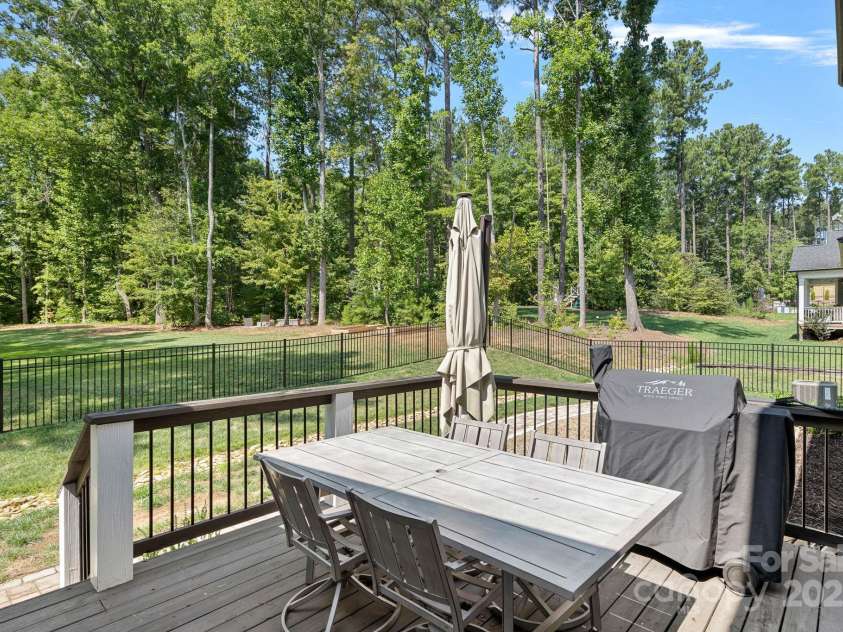 4195 Island Fox Lane, Denver, NC 28037.  MLS# CAR4243299, YatesRealty ID 10051. Back deck designed for outdoor dinners and entertaining.